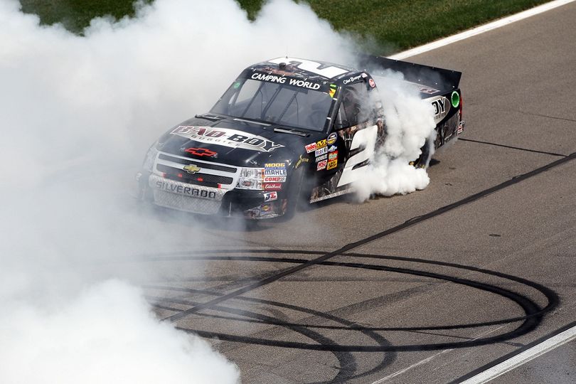 Clint Bowyer celebrates wining the O'Reilly Auto Parts 250 with a burnout at Kansas Speedway. (Photo Credit: Jamie Squire/Getty Images for NASCAR) (Jamie Squire / Getty Images North America)