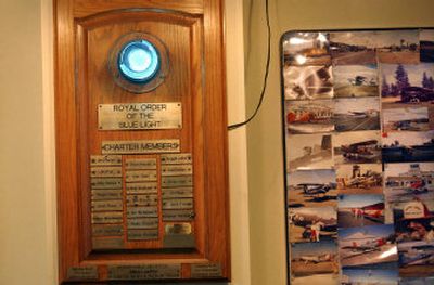 
The Royal Order of the Blue Light at the Skyway Cafe at Felts Field honors pilots and sometimes truck drivers who have broken the blinking blue runway markers. 
 (Brian Plonka / The Spokesman-Review)