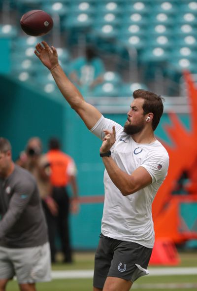 Seattle Seahawks quarterback Jacob Eason warms up while playing for the Indianapolis Colts on Oct. 3 in Miami Gardens, Fla.  (Tribune News Service)