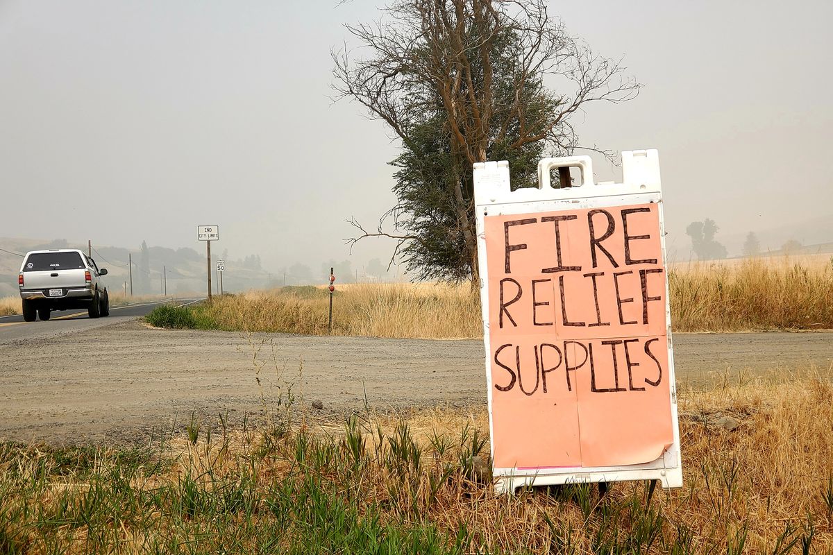 Several churches in Rosalia have collected donations of clothes, toiletries, food, tools and other items for those displaced by a Sept. 7 wildfire that decimated the neighboring town of Malden.  (Chad Sokol / The Spokesman-Review)