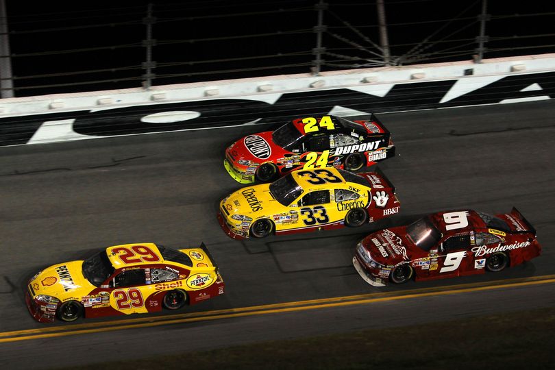 Kevin Harvick leads Kasey Kahne, teammate Clint Bowyer and Jeff Gordon during the closing laps of the NASCAR Sprint Cup Series Coke Zero 400 at Daytona International Speedway. Bowyer, who led the race four times for 19 laps, ended up spinning on the final lap of the Green/White/Checker and finished 17th. (Photo courtesy of Chris Trotman/Getty Images for NASCAR) (Chris Trotman / Getty Images North America)