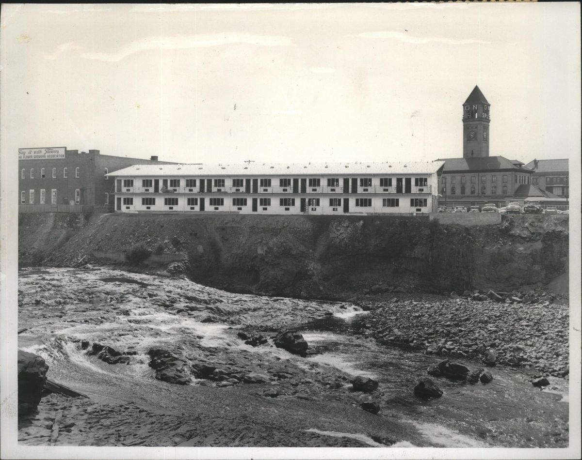 1959: The new Travelodge on Havermale Island is shown almost complete and ready to open. Some of the units had views of the Spokane River’s north channel, while the front of the building faced Havermale Avenue. The Great Northern depot, right, was within walking distance for train passengers. (Spokesman-Review Photo Archive)