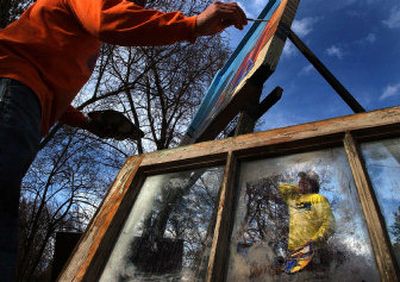 
Doug Miller and his partner, Adam Parker, recycle old windows and cabinets and turn them into art. The pair estimated that they have painted 1,500 windows and cabinets. The total weight they think they have recycled is nine tons.  
 (Photos by Jed Conklin/The spokesman-review / The Spokesman-Review)