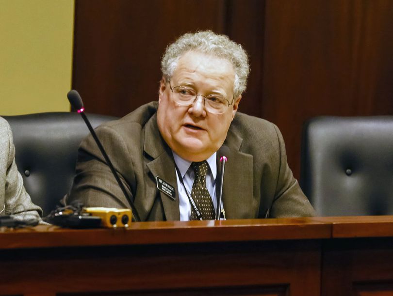 In this Jan. 8, 2015, file photo, former Idaho House Minority Leader John Rusche, D-Lewiston talks with reporters at the State Capitol about the upcoming legislative session. Rusche was recently nominated by the Idaho governor to serve on a state water board, but his confirmation is being delayed by lawmakers concerned over his previous social media posts. (AP / Otto Kitsinger)