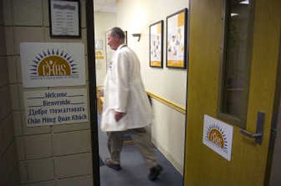 
Dr. David Bare greets patients as he enters the CHAS Northeast Clinic on Monday. 
 (CHRISTOPHER ANDERSON / The Spokesman-Review)