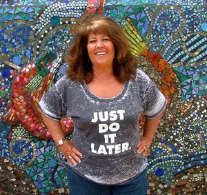 Kerri Thoreson modeling a T-shirt with a message intended to get older people to try new things.