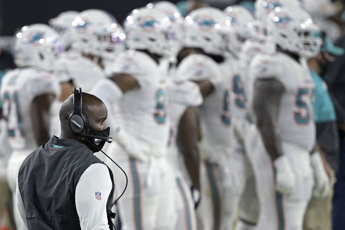 Miami head coach Brian Flores watches from the sideline during the first half of the Dolphins’ game against the Jacksonville Jaguars on Sept. 24 in Jacksonville, Fla.  (Phelan M. Ebenhack)