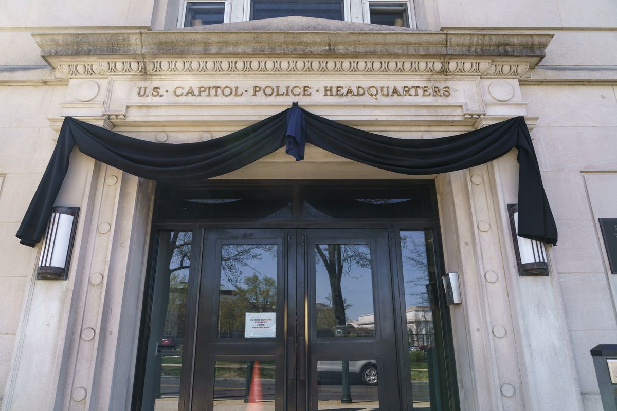 The U.S. Capitol Police Headquarters entrance in Washington, is draped in black Monday, April 5, 2021, after one officer was killed and another injured when a driver slammed into them at a barricade Friday afternoon. Security concerns over the events of the past four months may alter not only how the U.S. Capitol Police operate, but also whether the historically public grounds can remain open.  (J. Scott Applewhite)