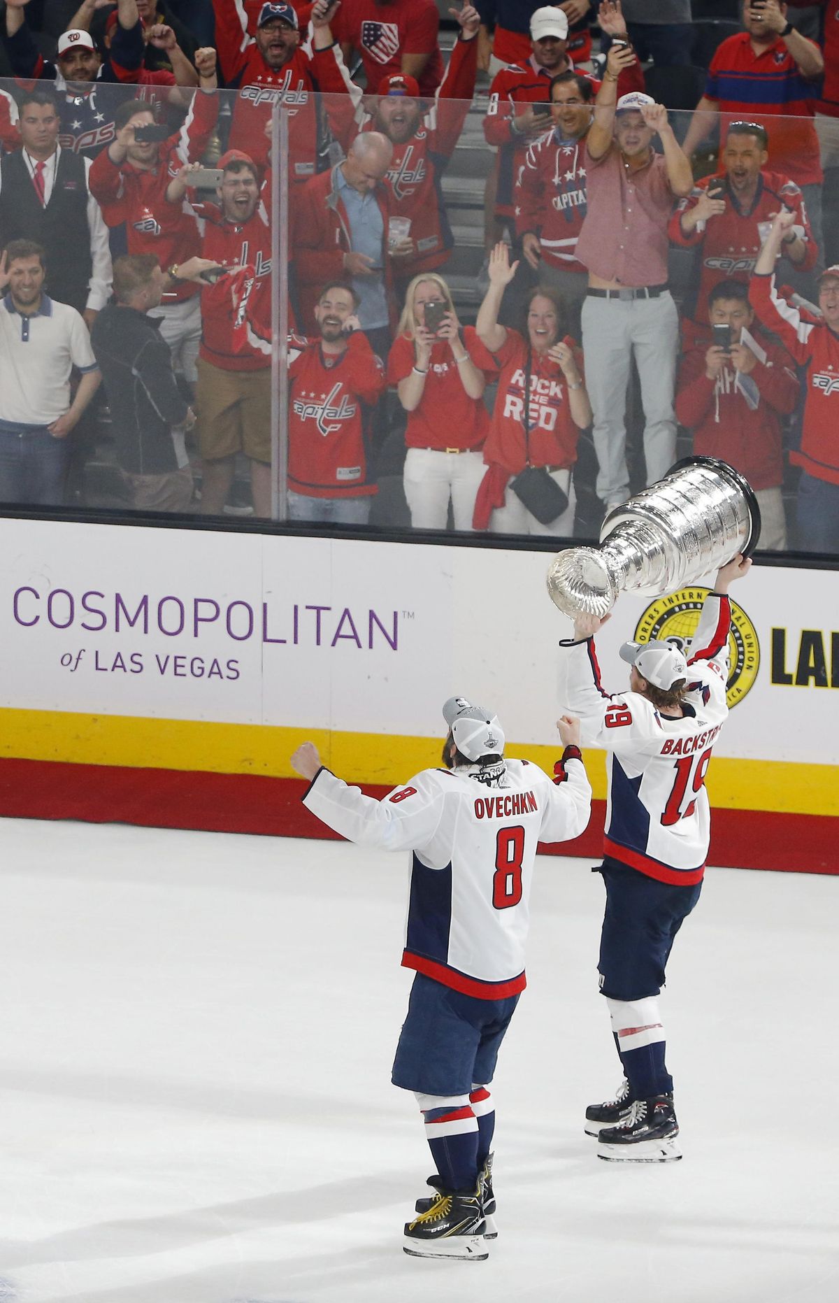 Washington Capitals center Nicklas Backstrom, right, of Sweden, carries the Stanley Cup as he skates with left wing Alex Ovechkin, of Russia, after the Capitals defeated the Golden Knights 4-3 in Game 5 of the NHL hockey Stanley Cup Finals Thursday, June 7, 2018, in Las Vegas. (Ross D. Franklin / AP)