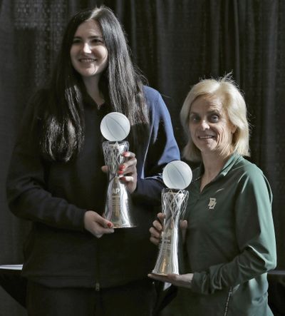 Iowa’s Megan Gustafson, left, and Baylor head coach Kim Mulkey, pose with their awards after being named The Associated Press player and coach of the year respectively during a news conference at the women’s Final Four NCAA college basketball tournament, Thursday, April 4, 2019, in Tampa, Fla. (Chris O’Meara / Associated Press)