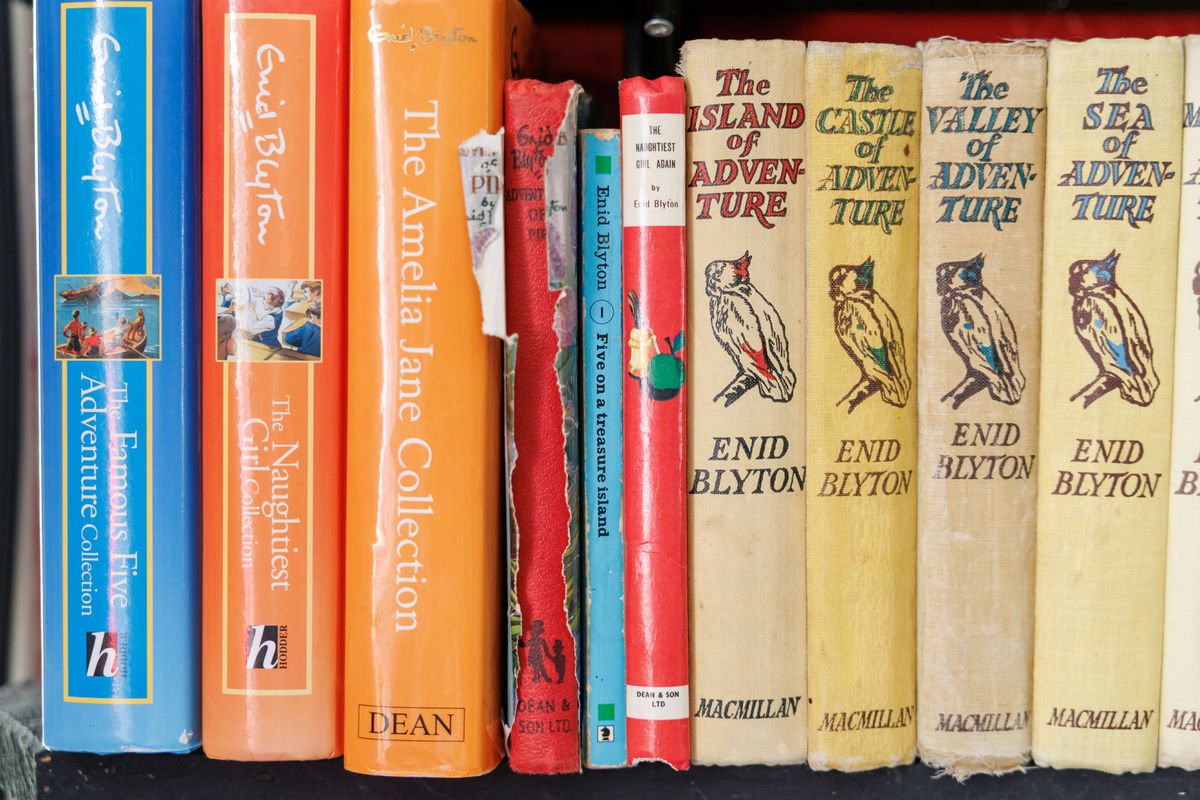 Enid Blyton books in Steve Mills’s collection in Hockley, England, June 25, 2025. Steve Mills has been collecting secondhand books in England to reawaken lost memories. His search revealed more about his family’s past than he thought possible.   (Jeremie Souteyrat/The New York Times)