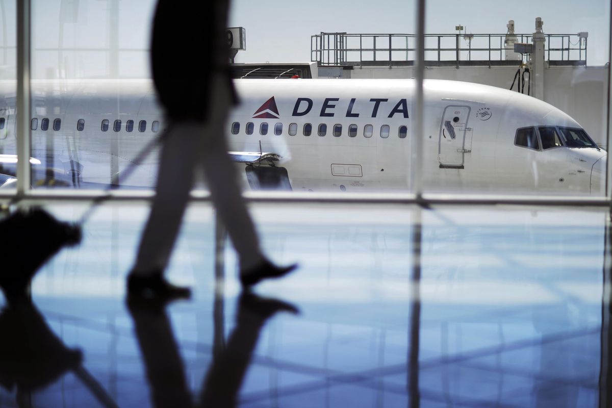 A Delta Air Lines jet sits at a gate at Hartsfield-Jackson Atlanta International Airport in Atlanta on Oct. 13, 2016. (Associated Press)