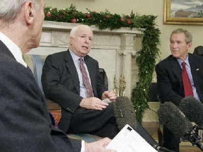 
U.S. Sen. John McCain, R-Ariz., and President Bush  speak to reporters in the Oval Office on Thursday  about the ban on all forms of torture on detainees held by the U.S. military.
 (AFP/Getty Images / The Spokesman-Review)