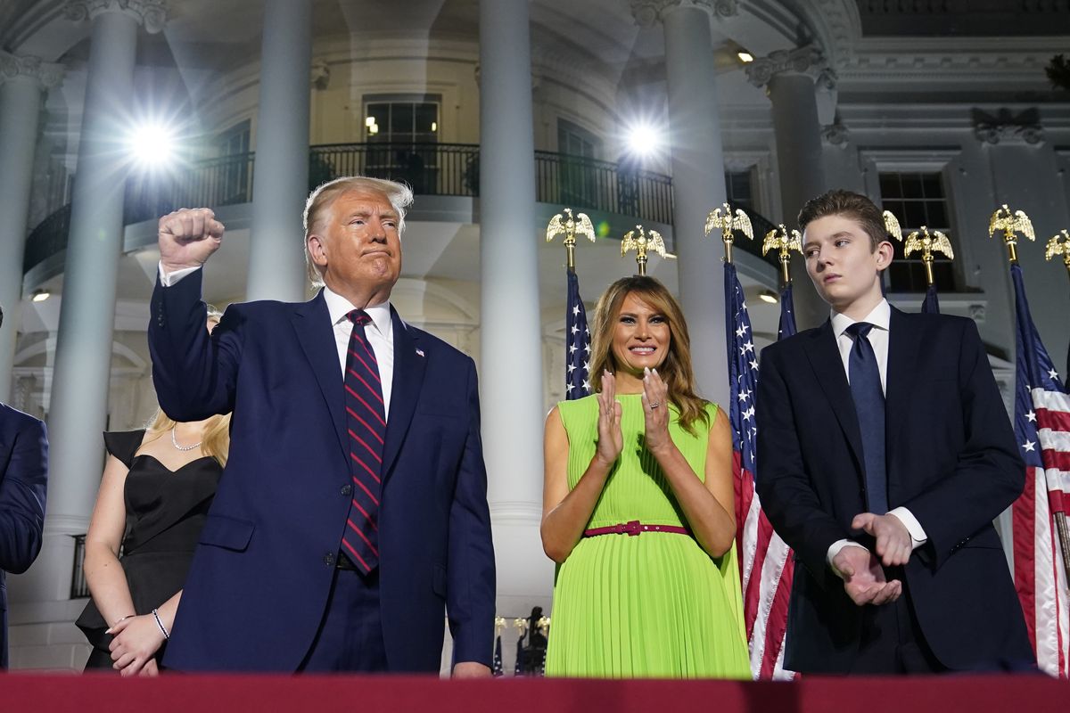 President Donald Trump, first lady Melania Trump and Barron Trump stand Aug. 27 on the South Lawn of the White House during the Republican National Convention.  (Evan Vucci)