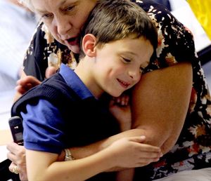 "There's nothing like a grandchild," said Claudya Shane of Clark Fork, as she hugged her grandson, Ben Crespo, during Grandparents Day at Holy Family Catholic School in Coeur d'Alene in this 2012 SR file photo. Ben was in first grade at the time. (Kathy Plonka, SR file photo)