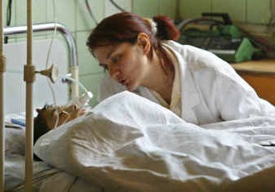 
Zalina Tetov speaks to her 10-year-old son Azamat on Wednesday in a children's hospital in Moscow.Zalina Tetov speaks to her 10-year-old son Azamat on Wednesday in a children's hospital in Moscow.
 (Associated PressAssociated Press / The Spokesman-Review)