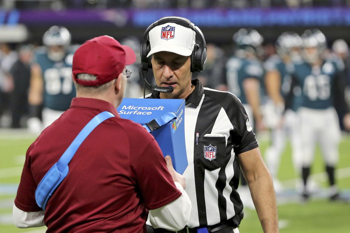In this Feb. 4, 2018, file photo, referee Gene Steratore reviews a touchdown reception by Philadelphia Eagles