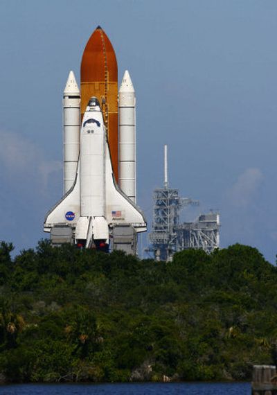 
NASA sends Atlantis back to the launch pad Tuesday after forecasts for Tropical Storm Ernesto had improved. 
 (Associated Press / The Spokesman-Review)