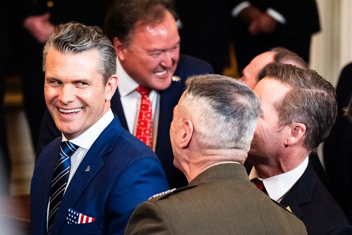 Defense Secretary Pete Hegseth mingles with military leaders and other officials during a White House ceremony April 15. MUST CREDIT: Demetrius Freeman/The Washington Post  (Demetrius Freeman/The Washington Post)
