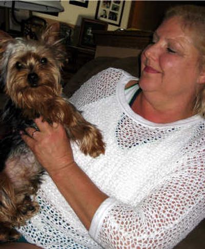 
Karen Greer says her Yorkshire terrier puppy Jordan Johann, recently saved her and her husband Kevin's life by alerting them to smoke filling their home after a pot of peas left on the stove caught fire.
 (The Spokesman-Review)