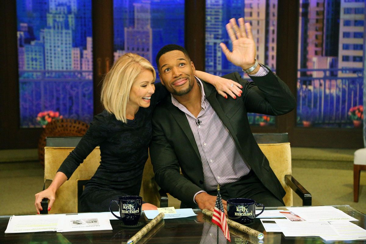 In this image released by Disney ABC Home Entertainment and Television Distribution, co-hosts Kelly Ripa, left, and Michael Strahan appear during the production of "Live! With Kelly and Michael" on Strahan