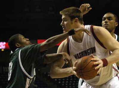 
Washington State has boosted its rebounding power with the presence of 6-foot-10 Aron Baynes. Associated Press
 (Associated Press / The Spokesman-Review)
