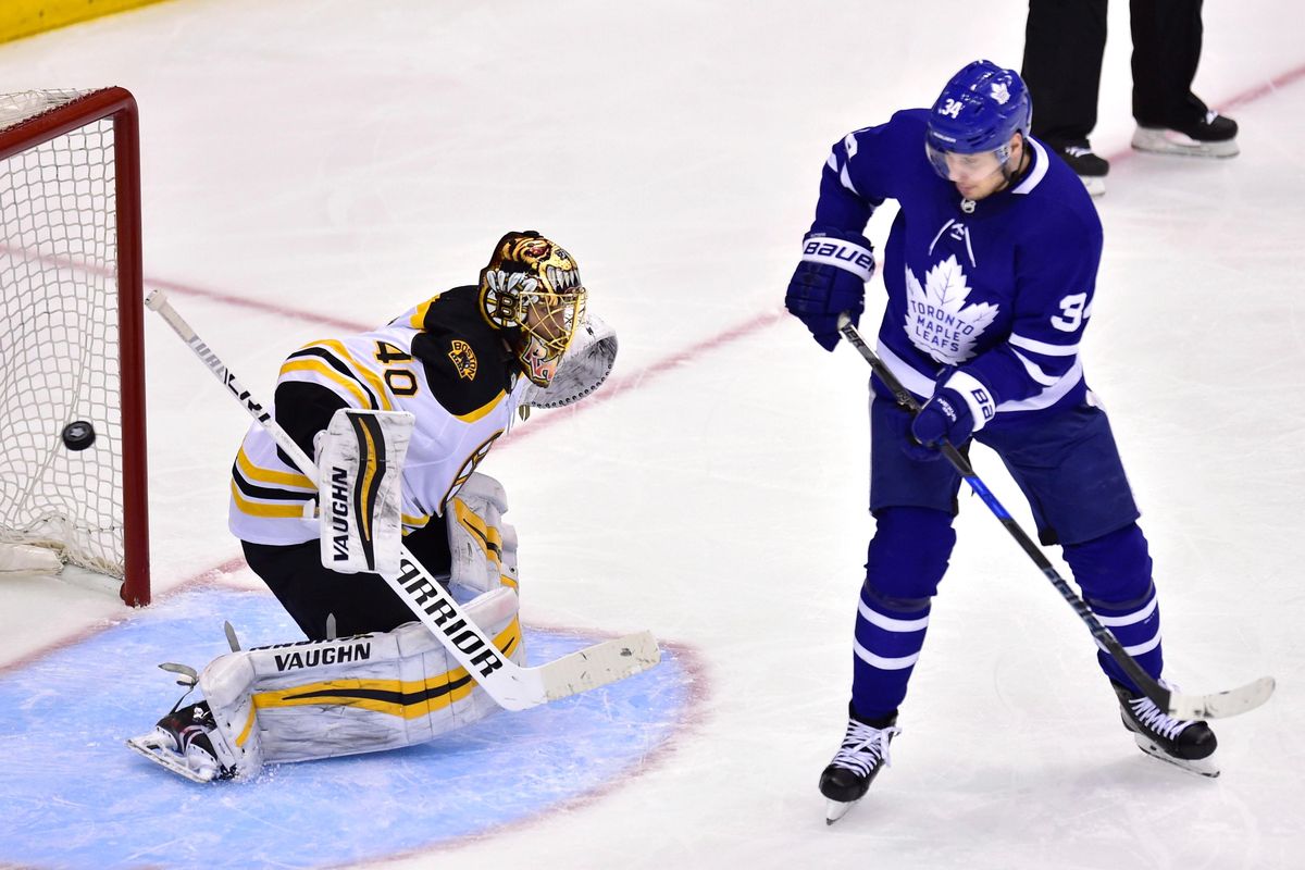 Boston Bruins goaltender Tuukka Rask (40) stops Toronto Maple Leafs center Auston Matthews (34) during the third period of Game 4 of an NHL hockey first-round playoff series Thursday, April 19, 2018, in Toronto. (Frank Gunn/The Canadian Press via AP) ORG XMIT: DPI546 (Frank Gunn / AP)