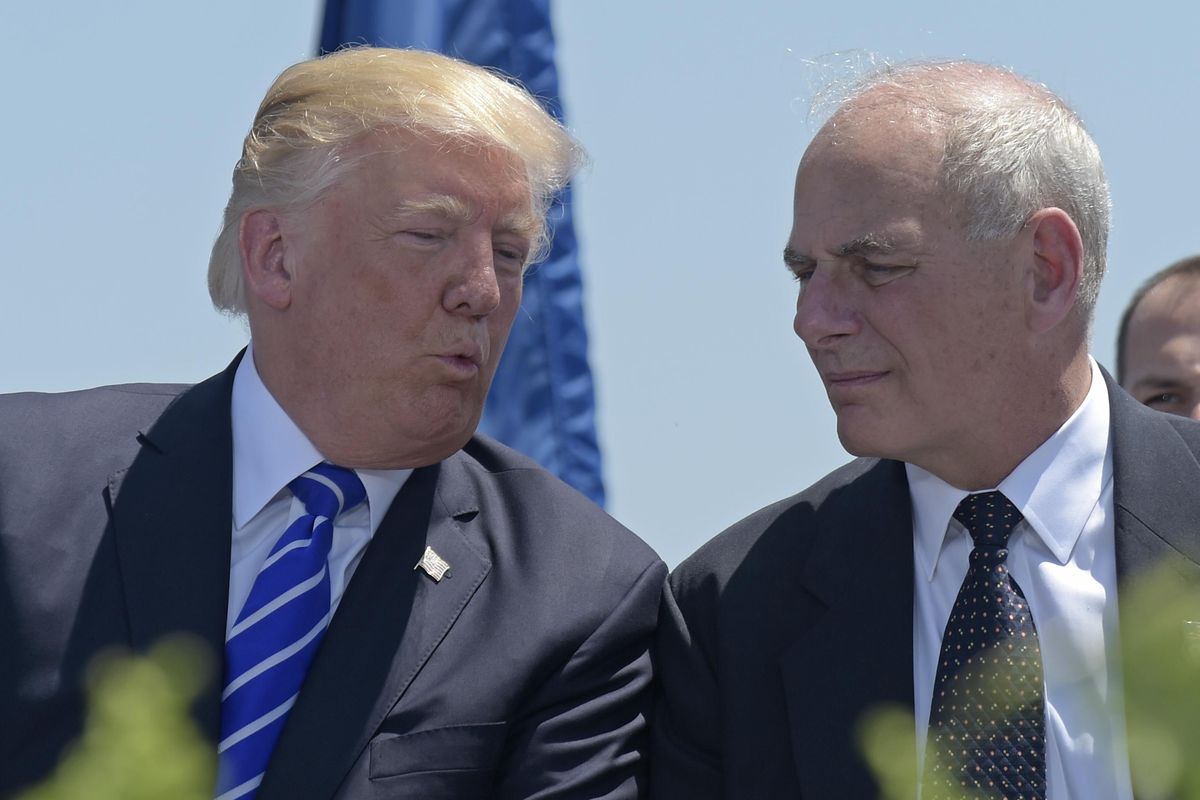 In this May 17, 2017, file photo, President Donald Trump talks with Homeland Security Secretary John Kelly during commencement exercises at the U.S. Coast Guard Academy in New London, Conn. Trump named Kelly as his new chief of staff on July 28, ousting Reince Priebus. (Susan Walsh / Associated Press)