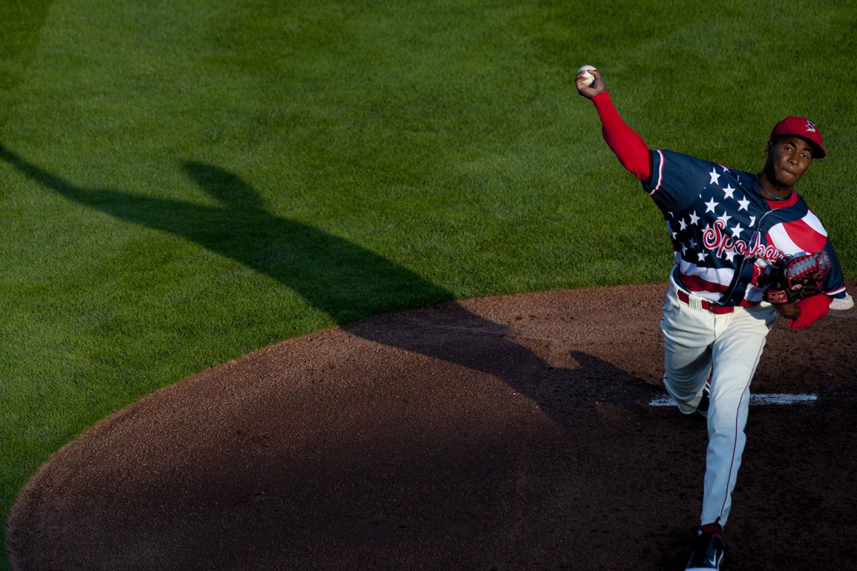 Spokane Indians pitcher Abel De Los Santos throws a pitch against the Yakima Bears. He didn’t allow a run in five innings. (TYLER TJOMSLAND PHOTOS)