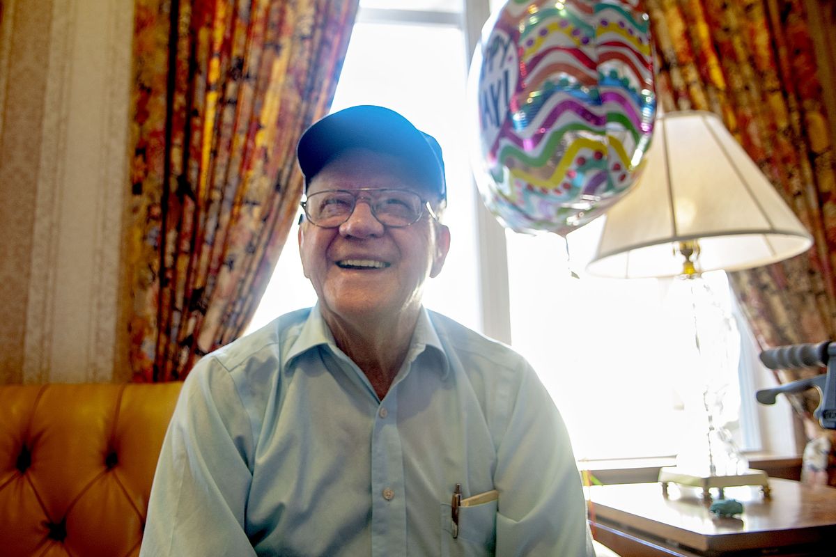 J.R. Cox talks Friday about his upcoming 100th birthday at Fairwinds retirement community in Spokane. (Kathy Plonka)