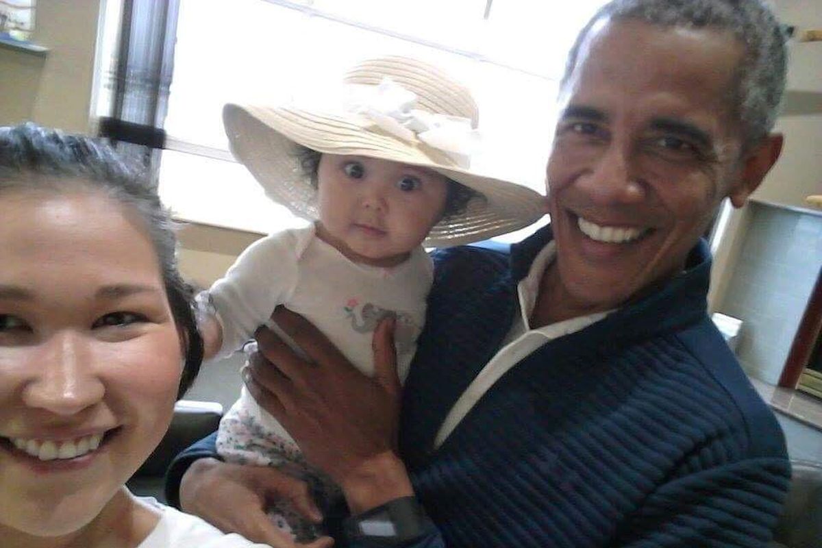 In this July 3, 2017 photo provided by Jolene Jackinsky, former U.S. President Barack Obama holds Jackinsky