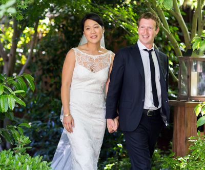 This photo provided by Facebook shows Facebook founder and CEO Mark Zuckerberg and Priscilla Chan at their wedding Saturday. (Associated Press)