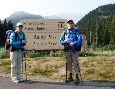 Karra Russell and her father, longtime search-and-rescue volunteer Kem Russell, stop for a photo op at Rainy Pass on the North Cascades Highway during a 2014 hike. (COURTESY PHOTO / COURTESY PHOTO)