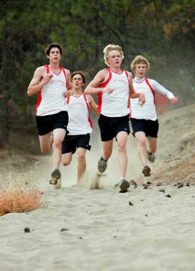 
St. George's boys cross country team members, from left, Sam Annan, Mike Wilhelm, Britton Stamper and Brian Angove. Photo courtesy of Dean Davis
 (Photo courtesy of Dean Davis / The Spokesman-Review)