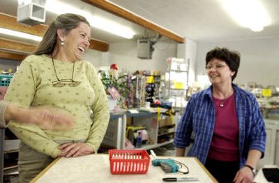 
Director Linda Kincaid, left, of the Women's Center, chats with Nadine McKenna of the Women's Center Thrift Store, which raises money for the center. 
 (Jesse Tinsley / The Spokesman-Review)