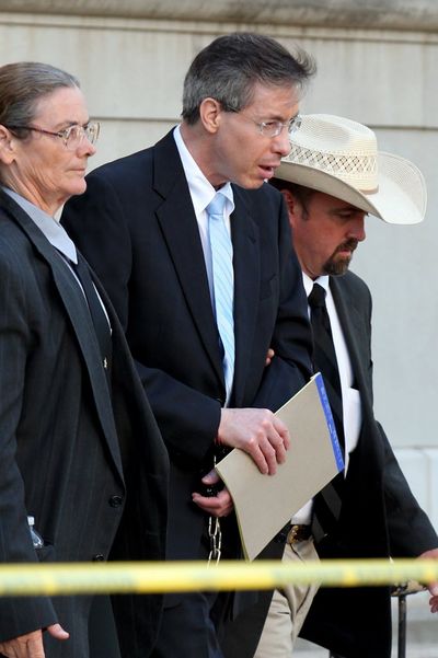 Convicted polygamist leader Warren Jeffs is escorted from courth in San Angelo, Texas, Aug. 8, 2011.  (AP Photo/San Angelo Standard-Times, Patrick Dove)