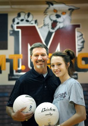 Mt. Spokane volleyball coach John Reid and daughter Kenzie have the Wildcats on the rise.  (Christopher Anderson)