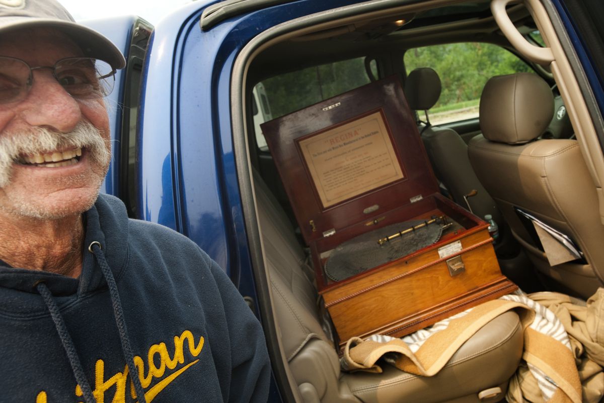Richard Zbyszewski proudly shows his wife’s antique music box on Sunday in Carlton, Wash. Zbyszewski said he pulled it out of their home as fires approached and left it in the back of the car. See a gallery of photos from Sunday at www.spokesman.com/picture-stories . (Tyler Tjomsland)