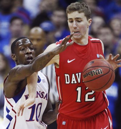 Nik Cochran poured in a game-high 21 points as the Davidson Wildcats upset 12th-ranked Kansas on Monday night. (Associated Press)