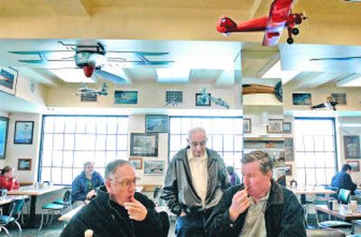 
From left, John Stone, Duane Williams and Jerry Goggin, eat lunch at Skyway Cafe on Wednesday.  