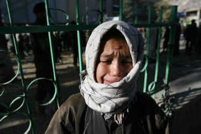 
An Afghan boy weeps Saturday when his father could not be found after a suicide blast in Kabul. Associated Press
 (Associated Press / The Spokesman-Review)