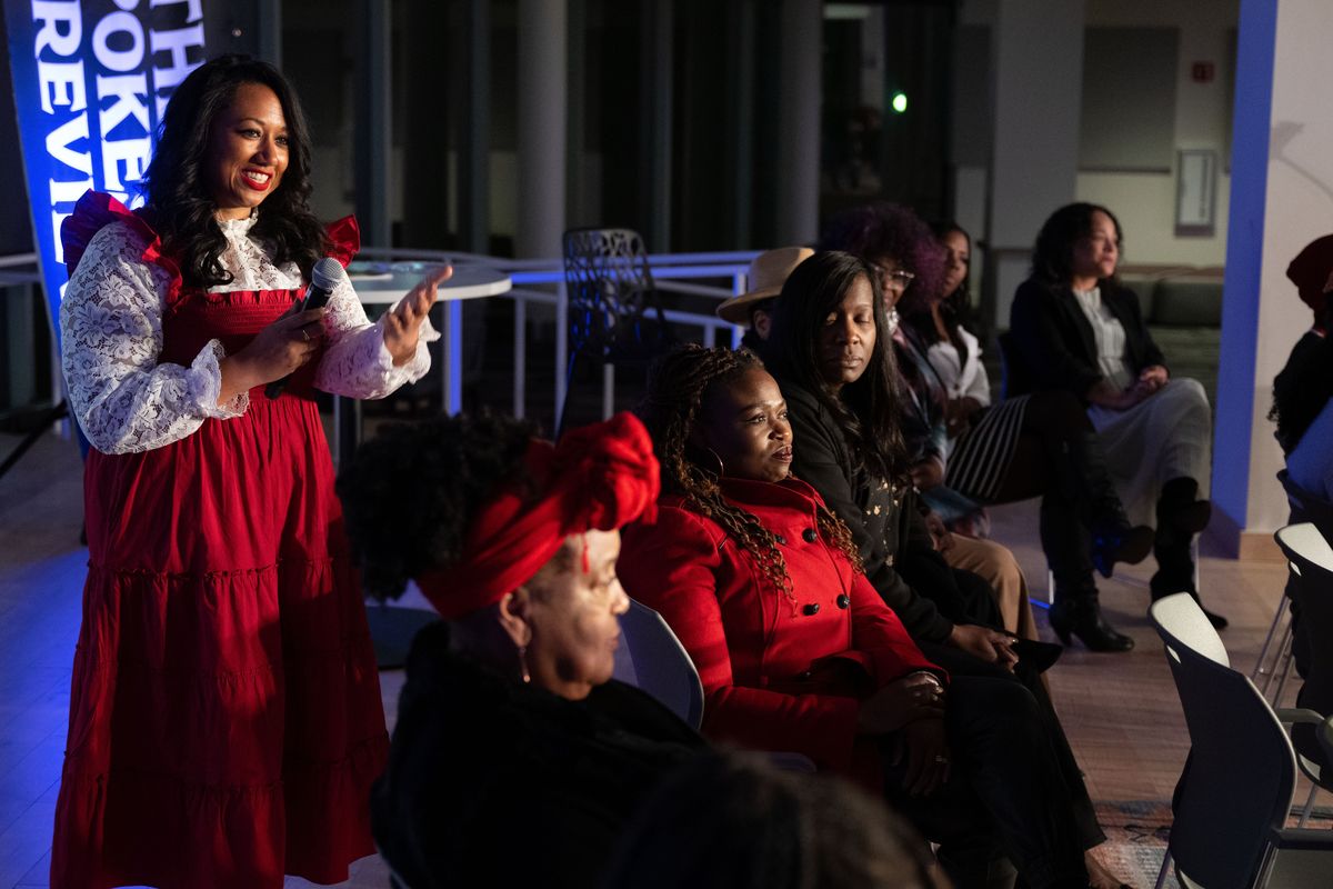 Shadle Park grad and Hollywood producer Mandi Price imparts advice to the younger generation of Black youth gathered at the Northwest Passages Spokane Black Symposium event on Wed., Feb. 15, 2023, at Central Library.  (COLIN MULVANY/THE SPOKESMAN-REVIEW)