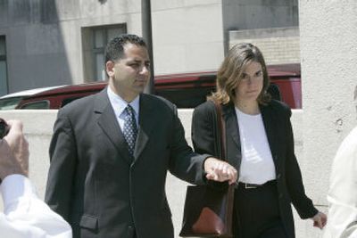 
Former White House aide David Safavian and his wife, Jennifer, leave the U.S. District Courthouse after he was found guilty Tuesday of covering up his dealings with Jack Abramoff. 
 (Associated Press / The Spokesman-Review)