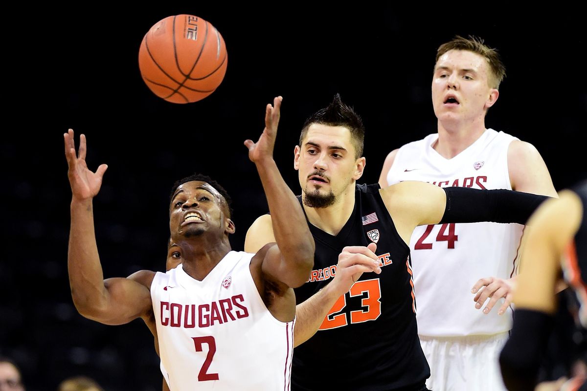 Washington State guard Ike Iroegbu (2) grabs a loose ball during the first half a NCAA men