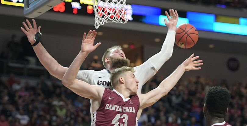 Gonzaga center Przemek Karnowski (24) and Santa Clara forward Nate Kratch (43) compete for a rebound during the second half of a WCC Tournament semifinal basketball game, Mon., March 6, 2017, at Orleans Arena in Las Vegas. (Colin Mulvany / The Spokesman-Review)