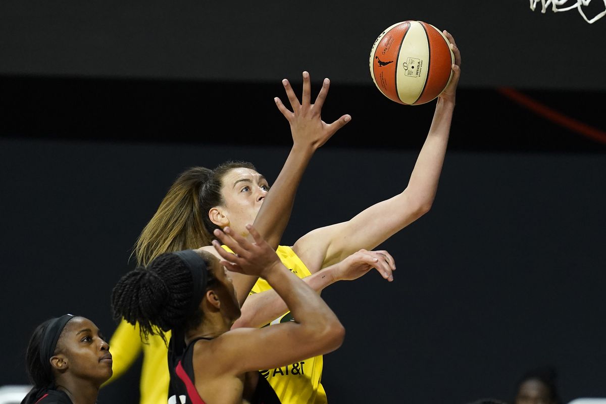 Seattle Storm forward Breanna Stewart (30) shoots over Las Vegas Aces guard Jackie Young and center A
