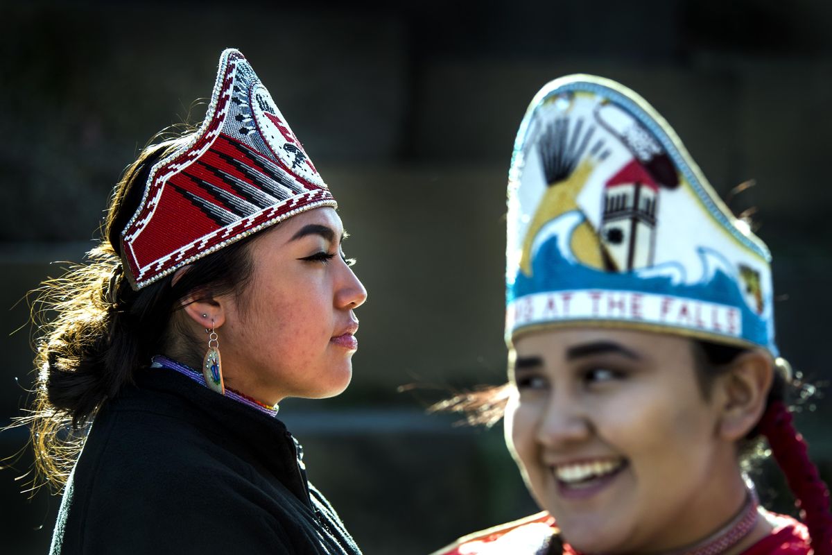 Thea Garcia, 18, Miss Spirit of the Eagle, left, and Karalyn Sagle, 17, 2014 Miss Gathering at the Falls, attend the Indigenous Peoples Day Celebration on Monday at the Spokane Tribal Gathering Place next to Spokane City Hall. (Dan Pelle / The Spokesman-Review)