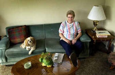 Marilyn Devine of Spokane relaxes with Keeta on Wednesday.
(Brian Plonka / The Spokesman-Review)
