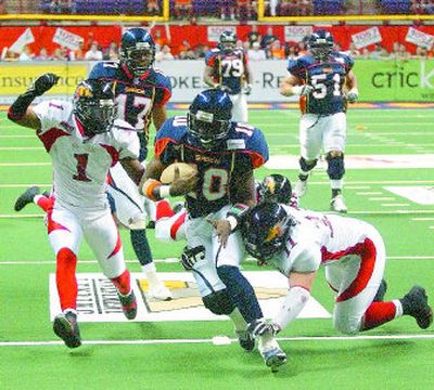 
Spokane Shock quarterback Andrico Hines has had to duck all of the misfortunes thrown in his way during his football career. 
 (Amanda Smith / The Spokesman-Review)