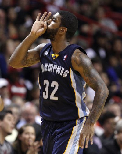 O.J. Mayo celebrates a 3-point shot as Memphis put seven players in double figures to beat Miami. Mayo finished with 10 points. (Associated Press)